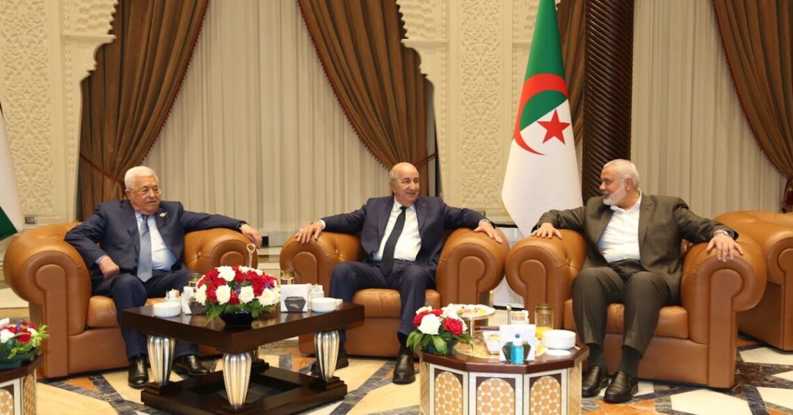 Palestinian rivals Abbas, Haniyeh shake hands in Algeria